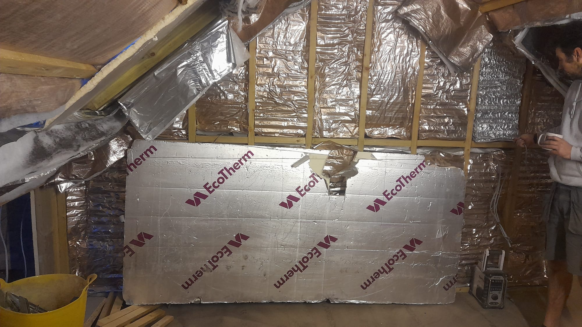 Insulation panels ready to be fitted in loft