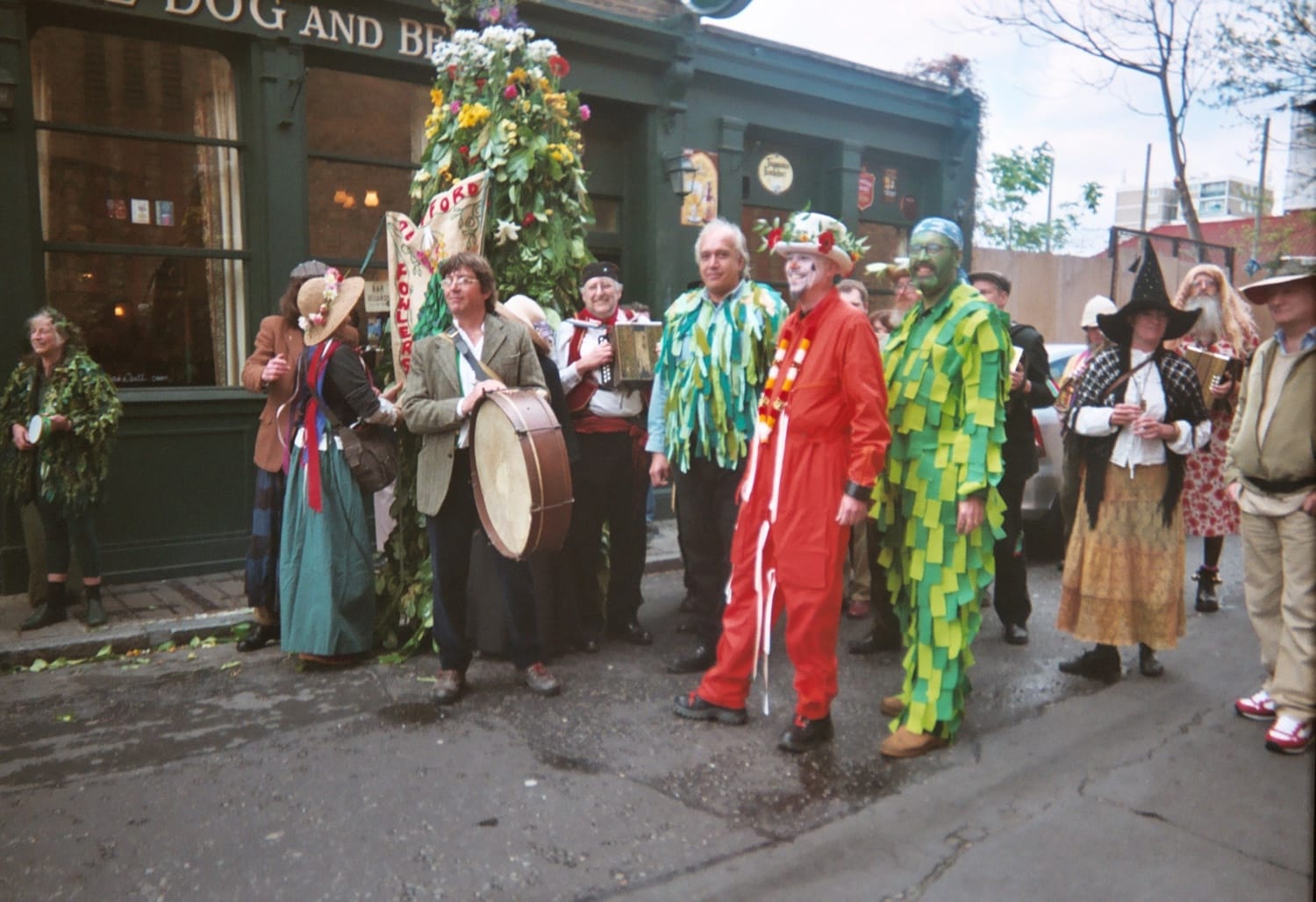 Fowlers troop in costume recreating the 1906 photograph, including the Jack "Green Man".