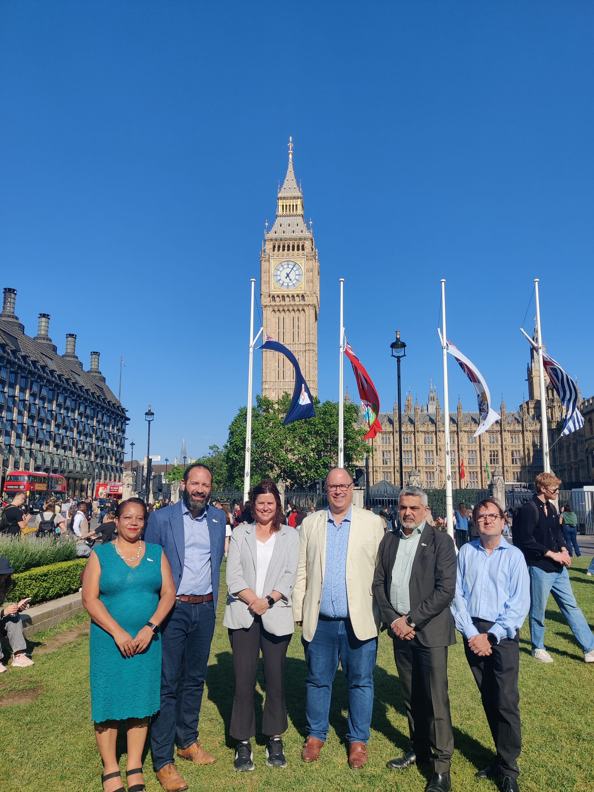 Brenda Dacres, Keiron Williams and others with Back the Bakerloo campaign at parliament square