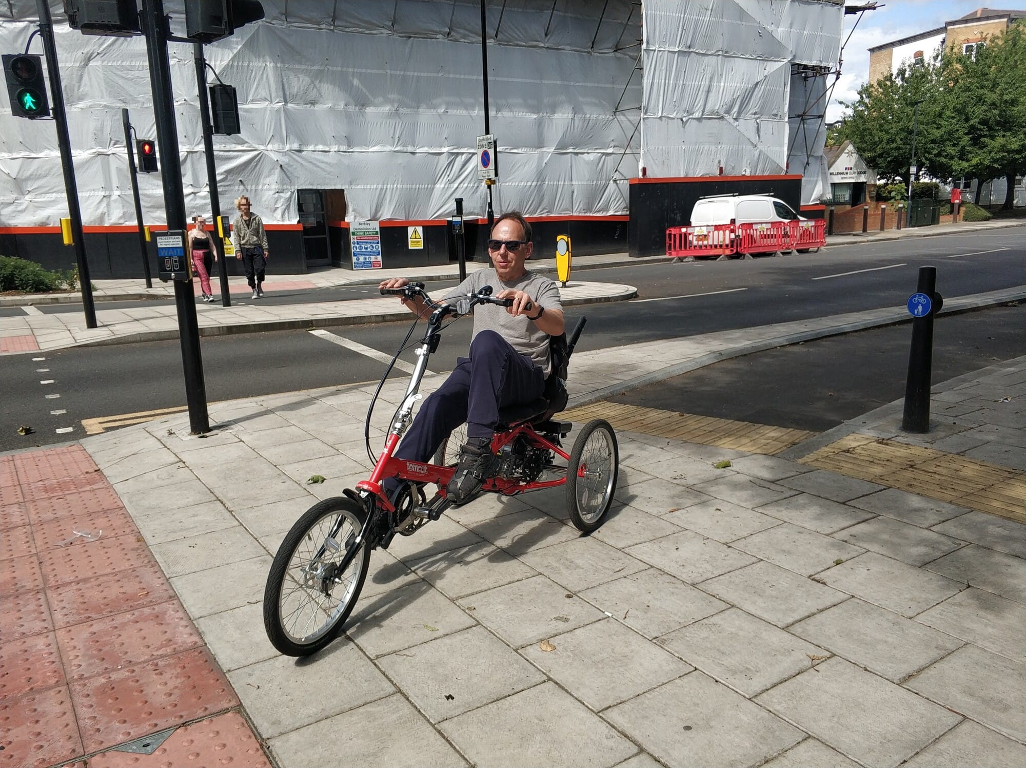 Person on e-assist trike, moving from Glaisher Street to C4 cycleway, Greenwich