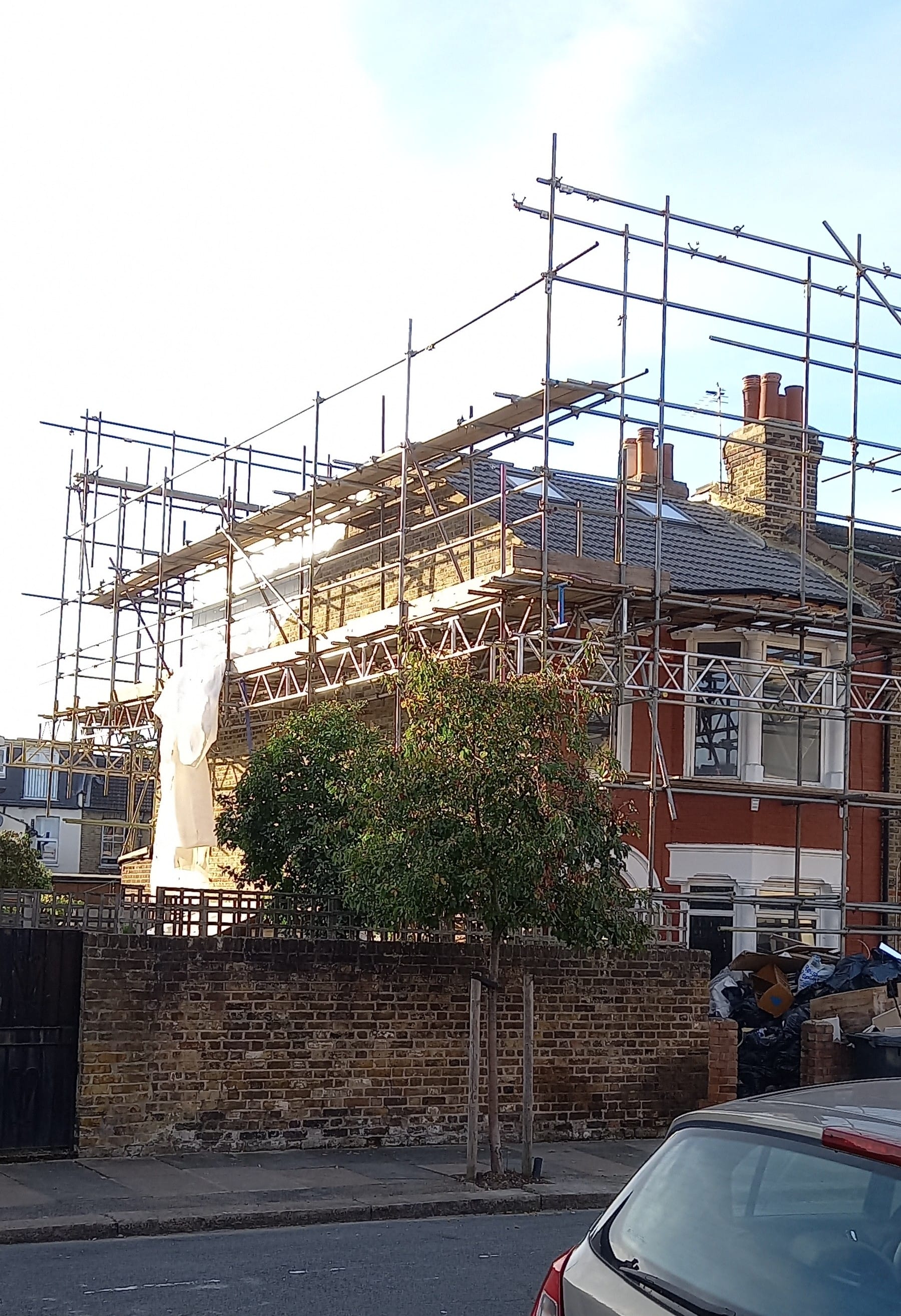 Signs of the housing crisis - conversion of property to HMO, Rushey Green.