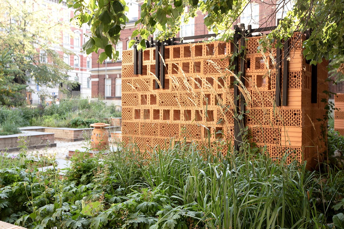 Honeycombed brick wall built for multiple species to nest in.