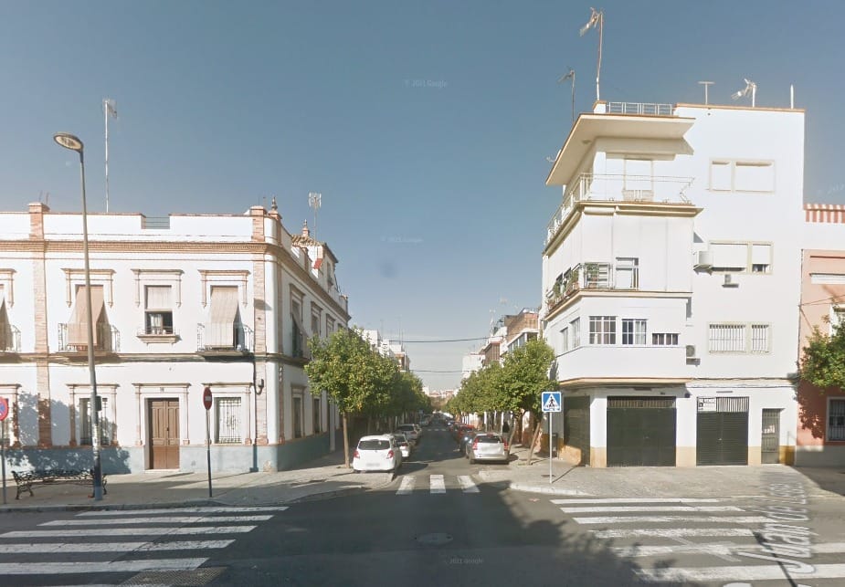 White painted residential buildings in Seville, Spain