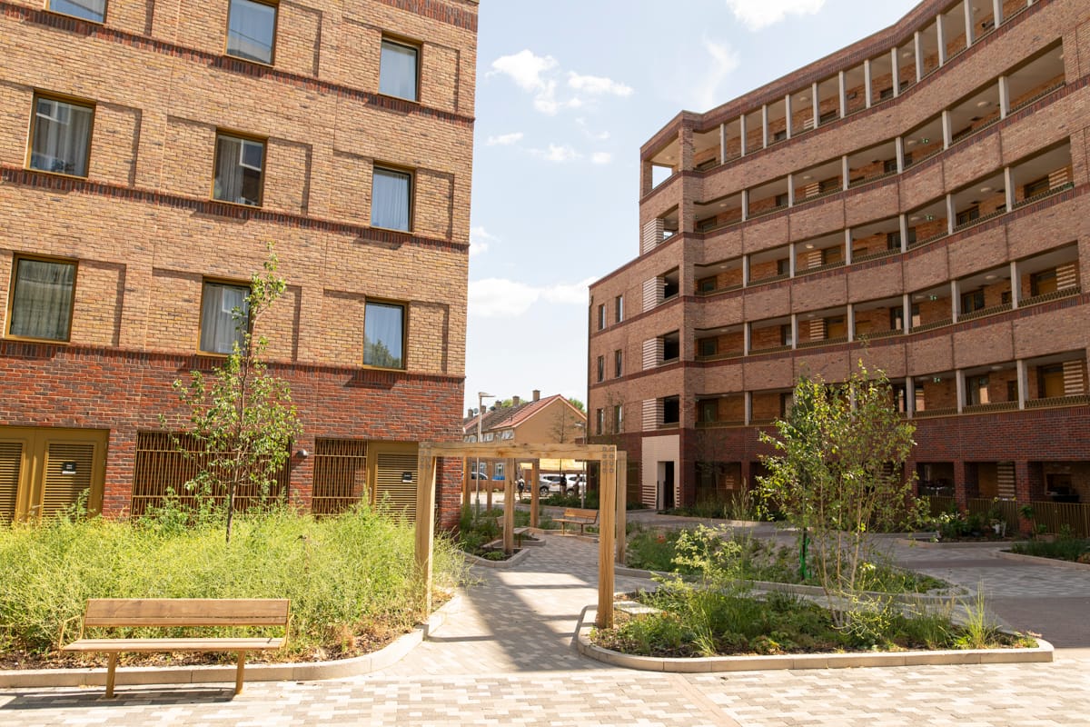 Melfield Gardens - Two 6 storey red brick blocks with walkways around courtyard