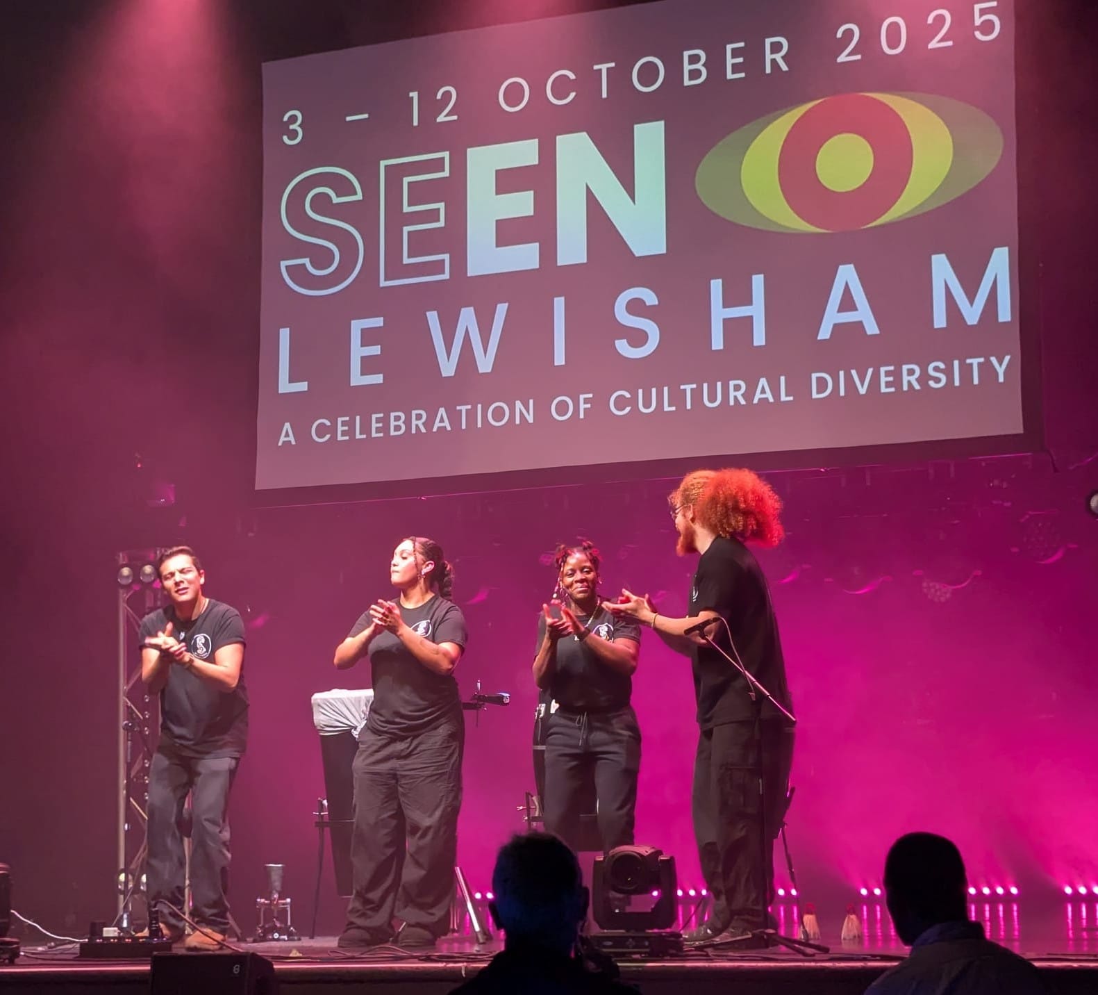 Four unaccompanied performers on stage, Isolin and GS Creative