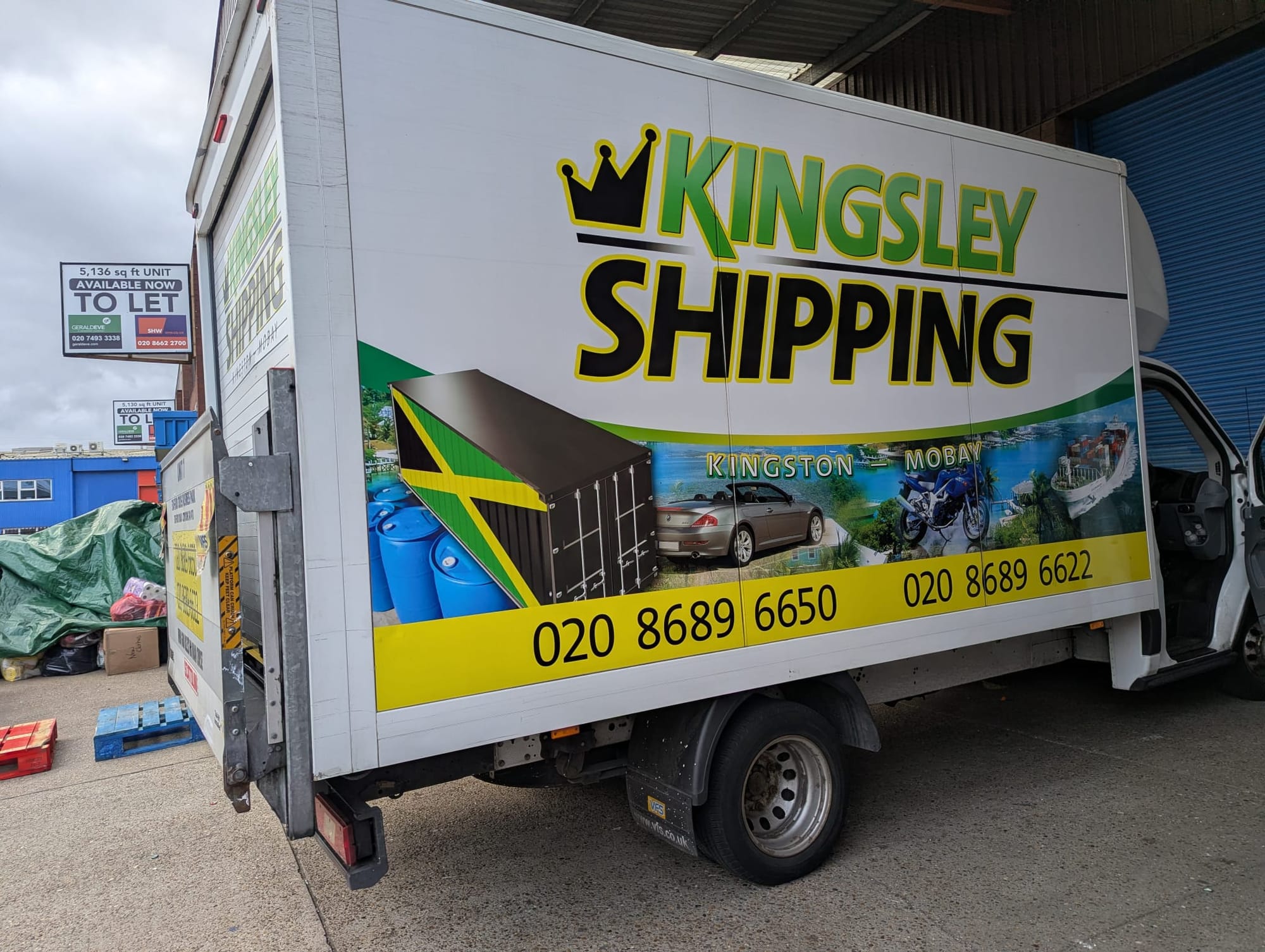 Kingsley Shipping van, "Kingston, Mobay" .. with Jamaican flag and images of Jamaica.