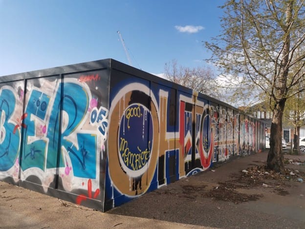 Another image of the graffiti covered hoardings, from 2022