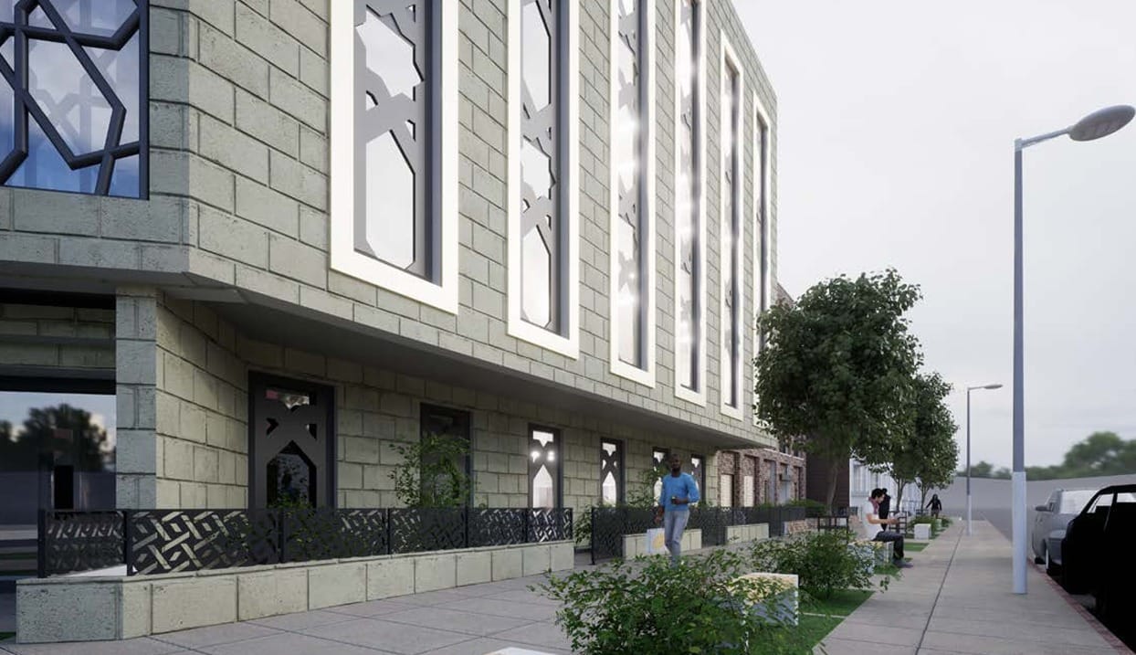 Side view of centre onto Mount Pleasant Road, with Islamic pattern designs over windows.