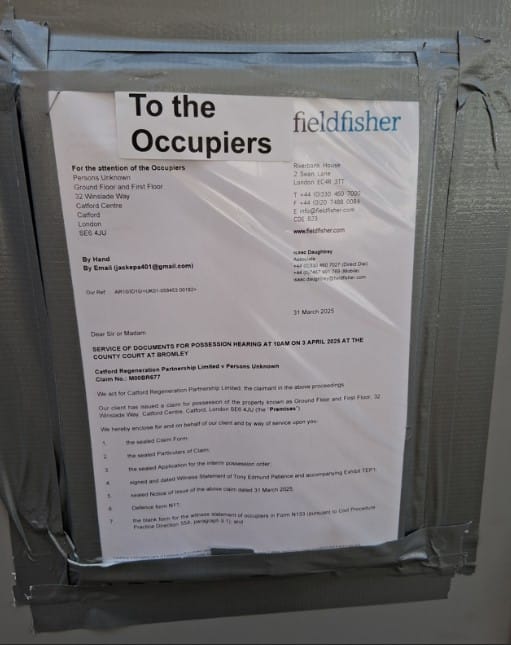 Eviction notice taped to the venue, March 2025