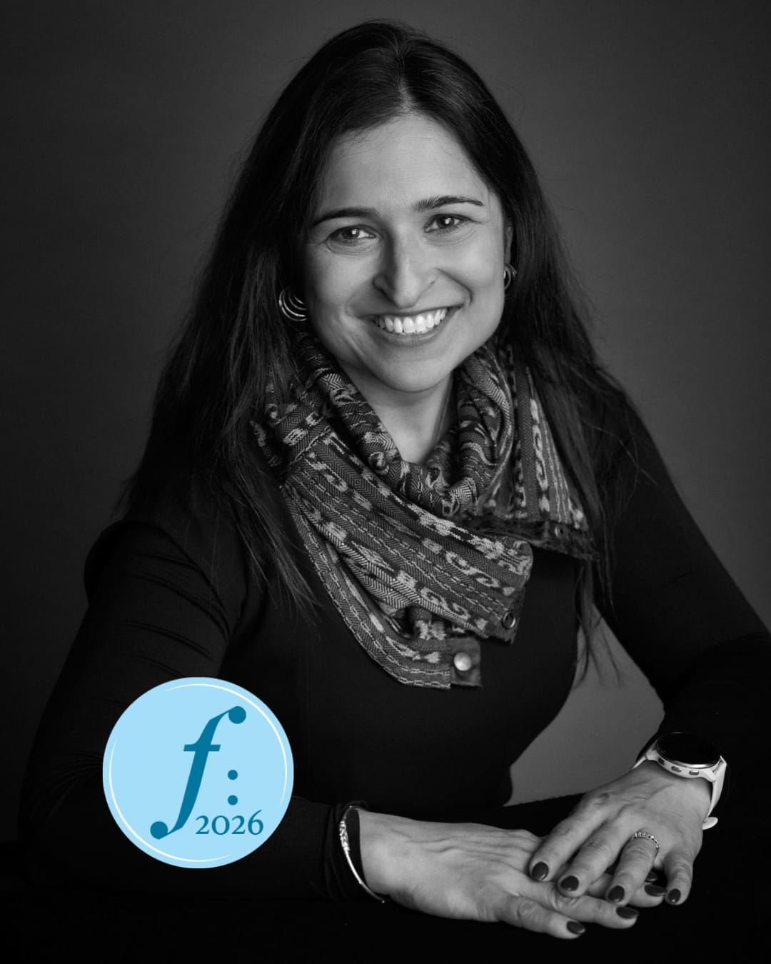 Portrait of Rupa Ganguli, smiling to camera. 