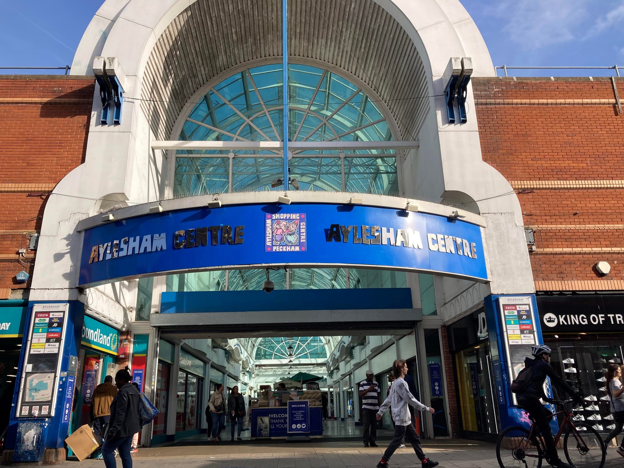 Aylesham Centre - entrance to shopping centre, covered mall with arched glass roof.