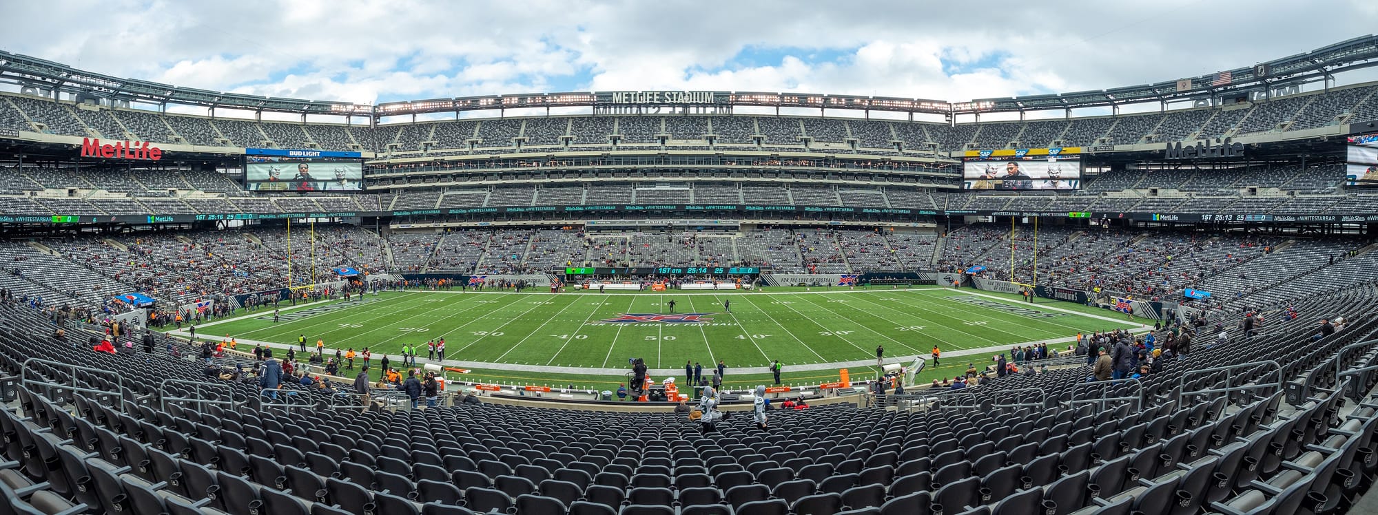 Wide angle shot of seats and pitch at huge New York Met Life stadium