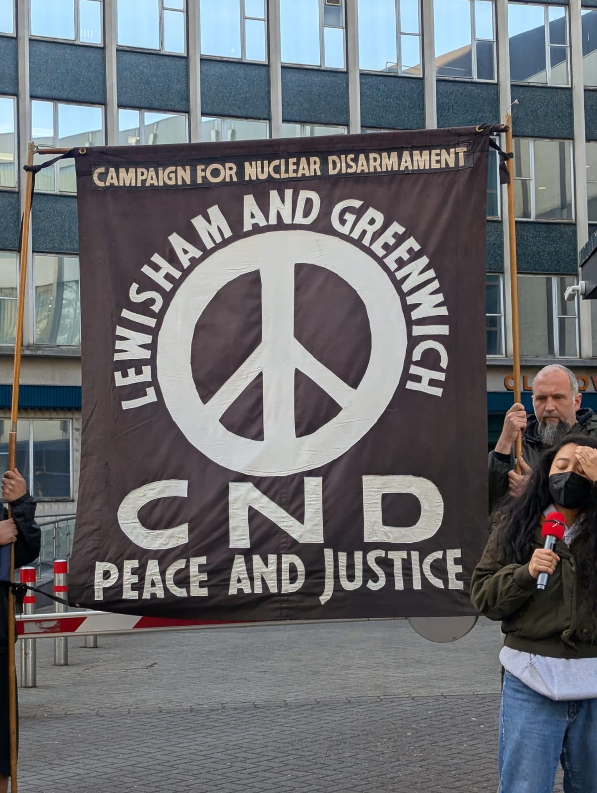 Lewisham and Greenwich CND banner at rally for divestment for Palestine outside the Town Hall before meeting.