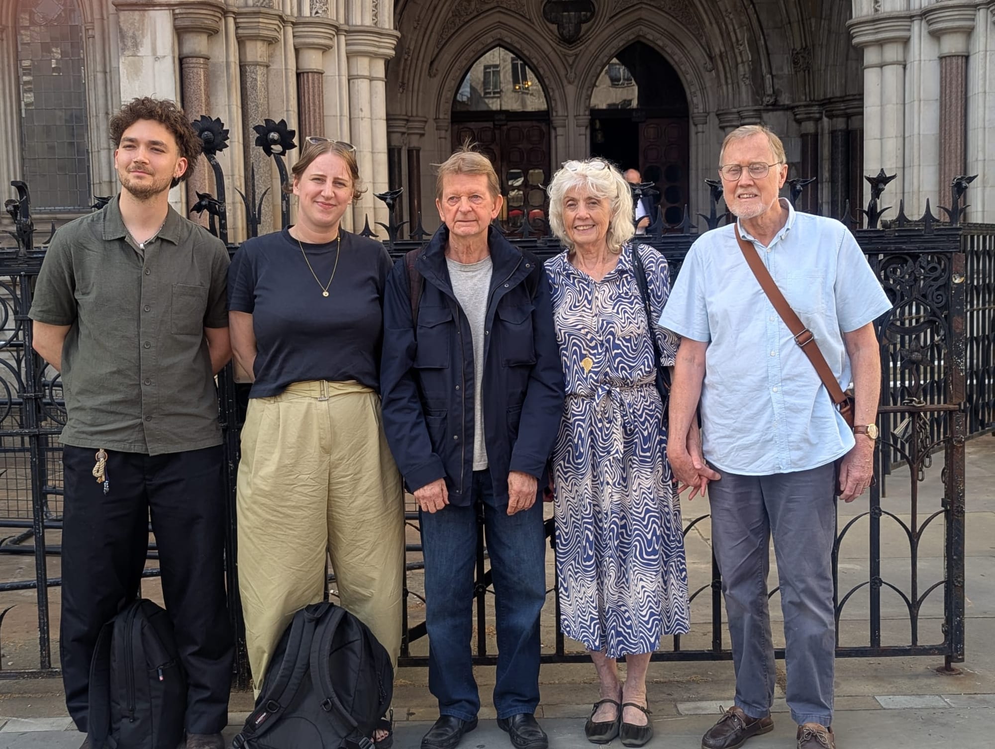 Councillor for Evelyn Dylan Cooper-Stubbs and campaigners outside the High Court.