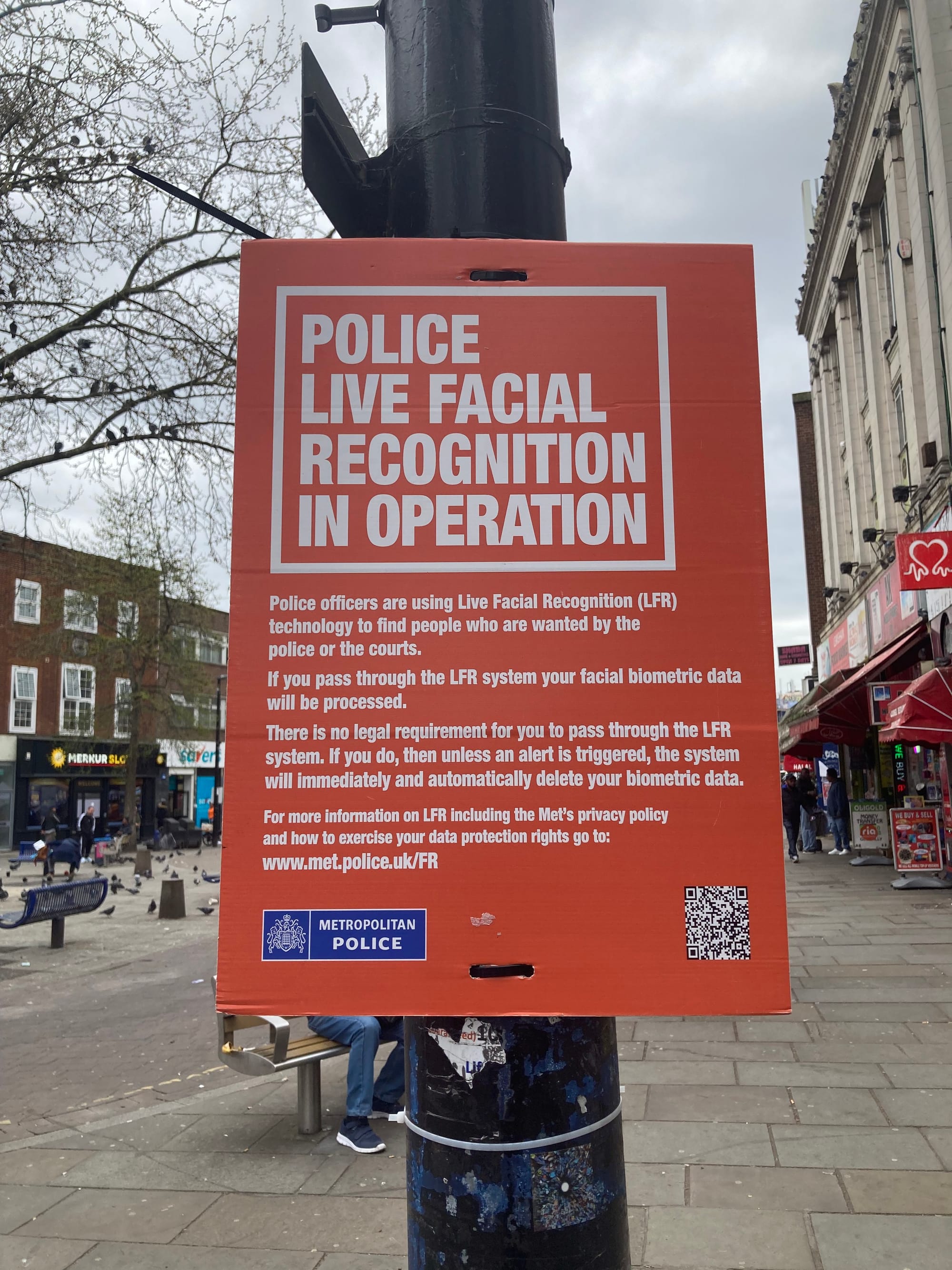 Met police sign in Lewisham, March 2024 'Police Live Facial Recognition in Operation'.