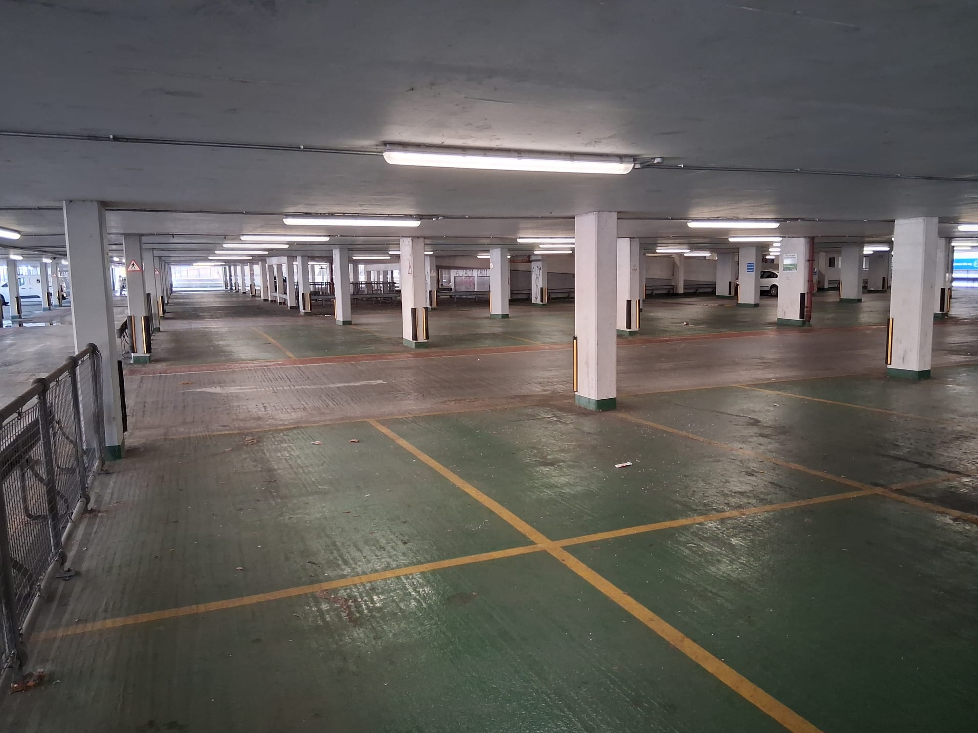 Holbeach car park, under Milford Towers - empty car park with concrete pillars and strip lighting.