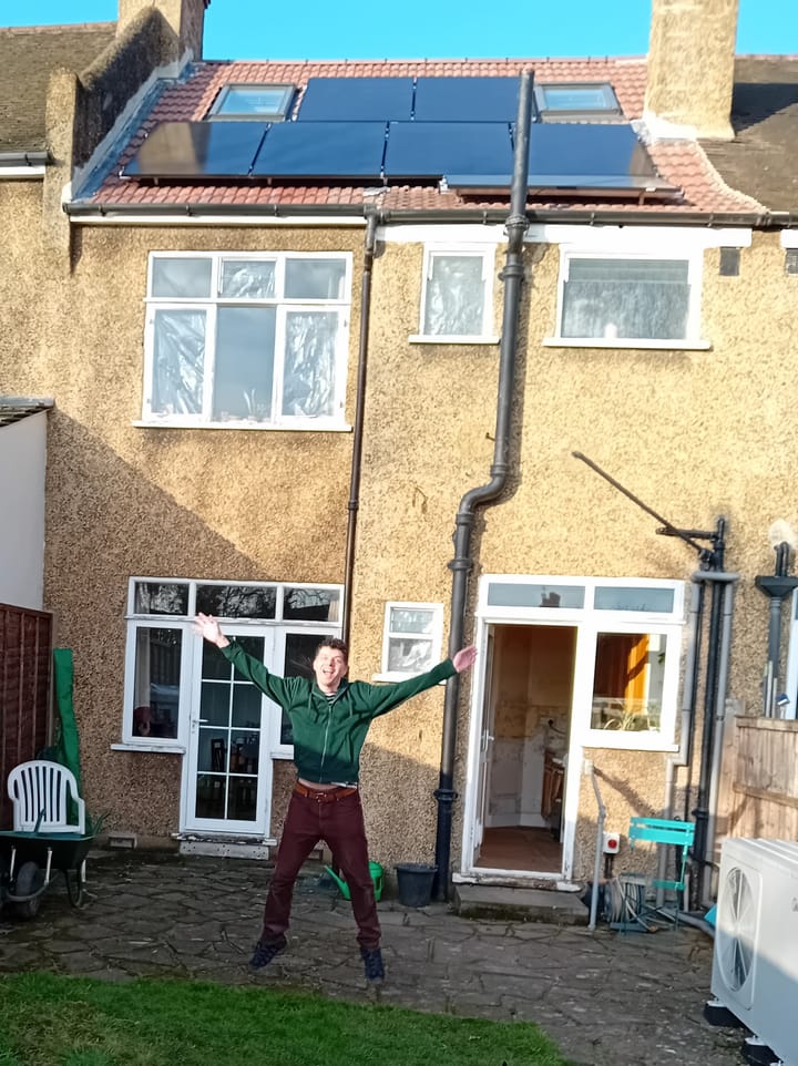 Solar goes live - Andy Stevens jumping in celebration in the garden