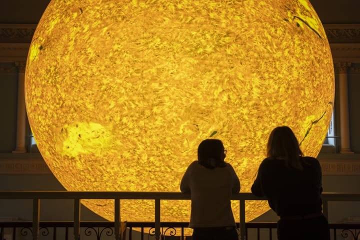 Two viewers of Helios at Bath Assembly rooms