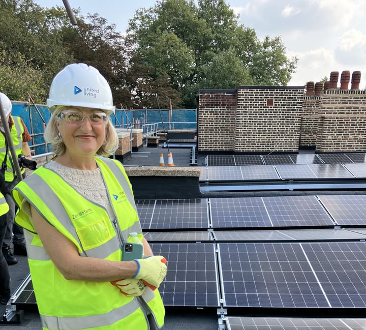 Louise Krupski, Deputy Mayor and Cabinet member for Environment, Transport and Climate Action inspects solar panels