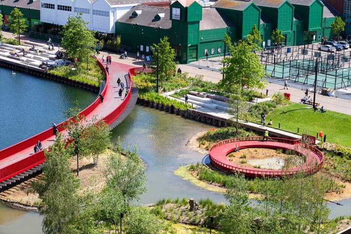 Red curved boardwalk over new wetlands, already provided in phase 1.