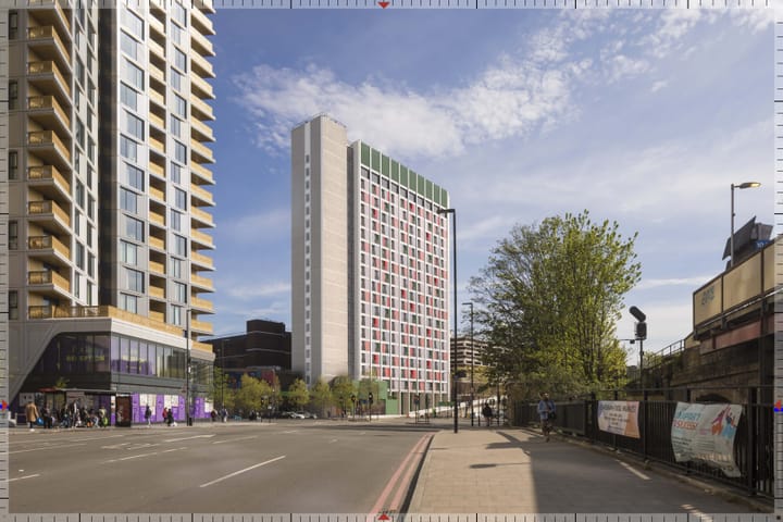 Design of renovated Lewisham House building, tower block with wide facade and coloured windows.