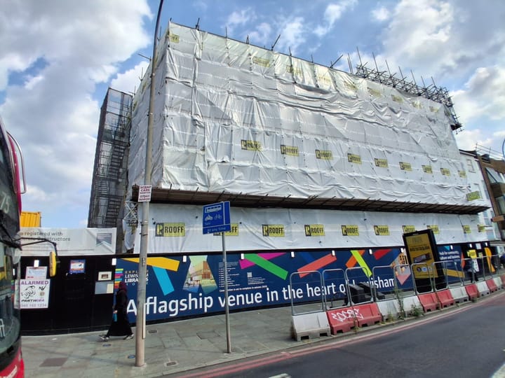 Plastic sheeting and scaffolding covering the Lewisham Library building